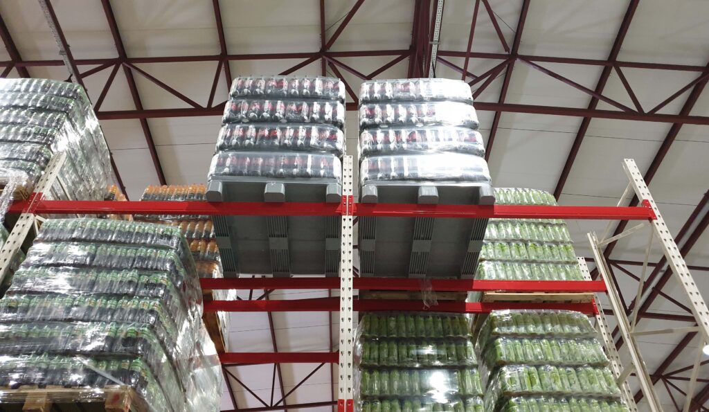 Plastic Pallet (heavy-duty) in the rack load heavy bottle of beverage. 