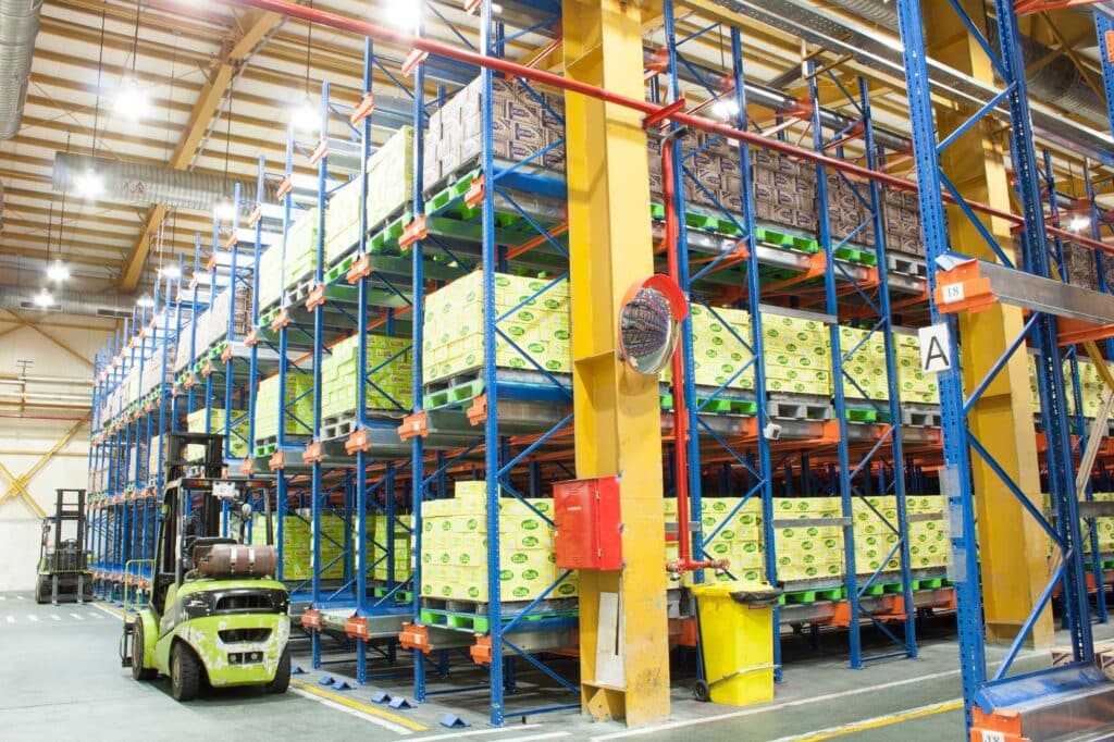 a warehouse of Savola oil stacked in a rack 