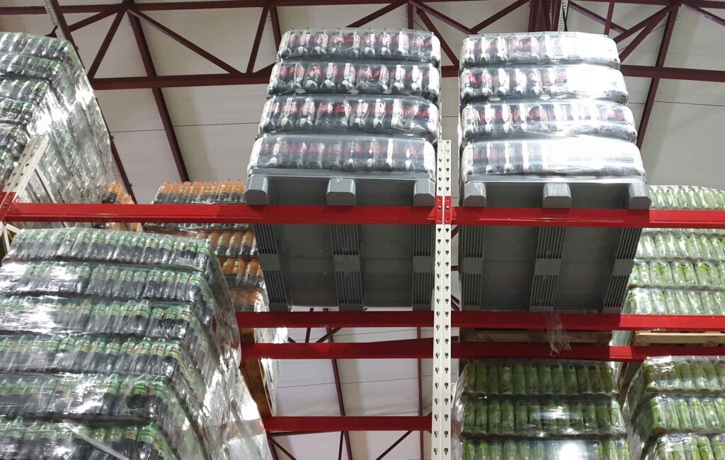the left photo describes a gray plastic pallets in medium-duty loading capacity with 3 skid runners holding bottles of Coca-Cola